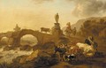 A mountainous landscape with drovers and their cattle crossing a bridge - (after) Nicolaes Berchem