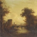 A ruined abbey and bridge in a river landscape with a town beyond - (after) James Stark