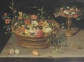 Roses, peonies, tulips, narcissi, carnations, poppies and other flowers in a basket and a gilt tazza, on a table - (after) Jan, The Younger Brueghel
