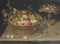 Roses, peonies, tulips, narcissi, carnations, poppies and other flowers in a basket and a gilt tazza, on a table - (after) Jan, The Younger Brueghel