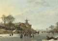 An extensive winter landscape with numerous figures by a 'koek en zopie', an iceskating race in the distance - Barend Cornelis Koekkoek