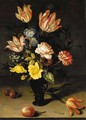 Tulips, irises, roses, forget-me-nots, chrysanthemums and hypericum in a roemer, with cherries, a plum, a tulip and a caterpiller on a stone ledge - Balthasar Van Der Ast