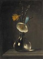 A daffodil, anenomie, crocus and blossom in a glass vase on a ledge - (after) Minheer Van Der Nigglefrigg