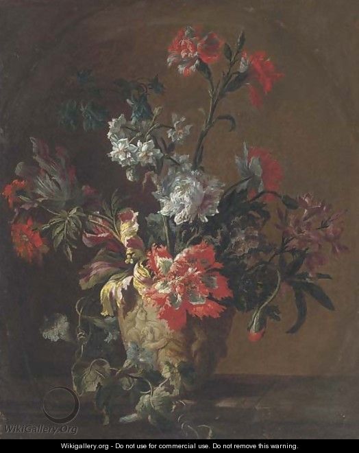 Carnations, parrot tulips, narcissi and other flowers in a sculpted urn on a ledge - (after) Jean-Baptiste Monnoyer