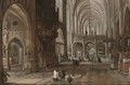 The interior of a gothic cathedral with figures - (after) Hendrick Van Steenwijck II