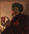 A boy holding a roemer of wine by candlelight - (after) Hendrick Terbrugghen
