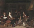 A kitchen interior with a woman cutting fish and a girl playing with a dog - (after) Adriaen Jansz. Van Ostade