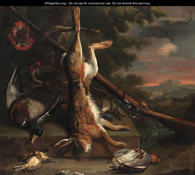 Still life of dead game, with a hare, a mallard, an English partridge and other birds with a gun by a tree, in a wooded landscape - Charles Collins