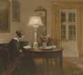 Woman Reading by Lamplight - Carl Vilhelm Holsoe