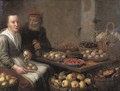 A kitchen interior with a peasant woman peeling a pear, at a table with grapes, plums, blackberries, cherries and other fruits on earthenware plates - Floris Gerritsz. van Schooten