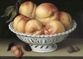 Peaches in a pierced white faience basket - Galizia Fede