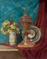 A vase of chrysanthemums and roses alongside an urn and a bowl, on a draped table - Eugene Henri Cauchois