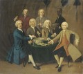 Gentlemen drinking and smoking pipes round a table in an interior, a servant bearing a bowl of punch - English School