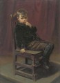 Portrait of a young boy sitting on a chair - English School