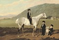 Three boys, one on a horse, in the grounds of a country house - English School
