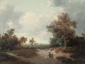 A wooded landscape with a peasant couple on a track - (after) Jacob Van Ruisdael