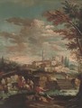 An Italianate river landscape with travellers and an angler on a river bank, a town beyond - (after) Gianbattista Cimaroli