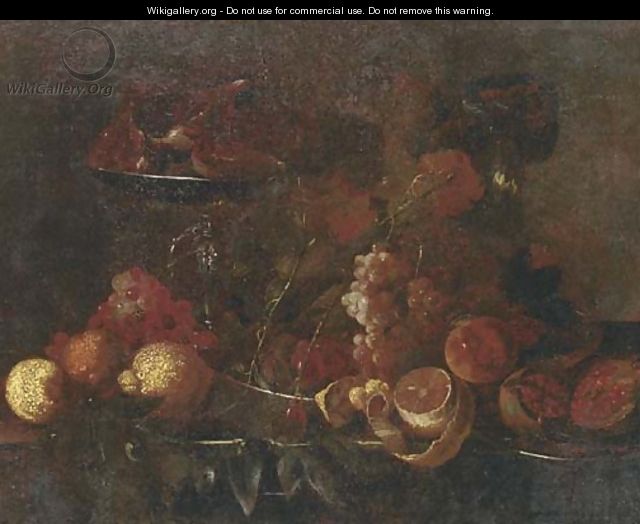 Grapes, lemons, pomegranates, an orange and other fruit on pewter platters - (after) Cornelis De Heem