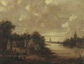 A moonlit river landscape with figures on a track, a church in the distance - (after) Aert Van Der Neer