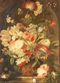 A flower still life with a bird's nest on a marble ledge - Dutch School