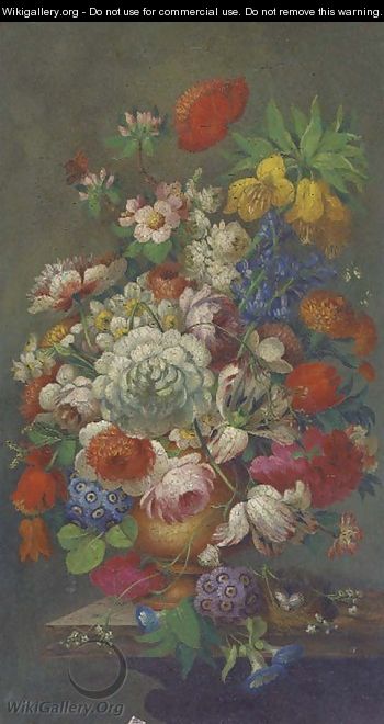 Roses, tulips, apple blossom, honeysuckle, narcissae and other summer flowers in a ewer by a birds