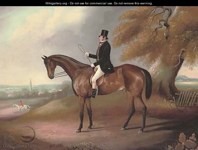 A gentleman and his hunter, a church spire beyond, in an extensive landscape - English School