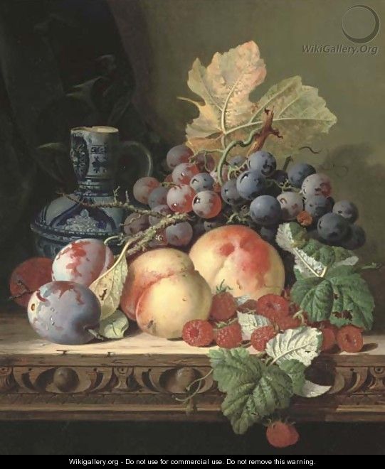 Plums, peaches, raspberries, grapes and a stoneware jug on a carved table - Edward Ladell