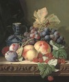 Plums, peaches, raspberries, grapes and a stoneware jug on a carved table - Edward Ladell
