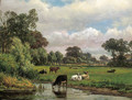Cows in a meadow, with a village in the distance - Dutch School