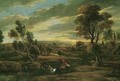An extensive landscape at sunset with a herdsman driving his cattle across a ford - (after) Sir Peter Paul Rubens
