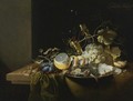 Still Life Of Hazelnuts, Grapes, Oysters And Other Foods On A Draped Table - Laurens Craen