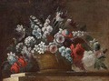 Still life of flowers in a basket, upon a stone ledge - Italian School
