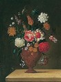 Still life of roses, tulips, carnations and other flowers in a gilt vas - French School