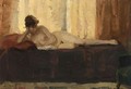 A Female Nude Reading On A Bed - Isaac Israels