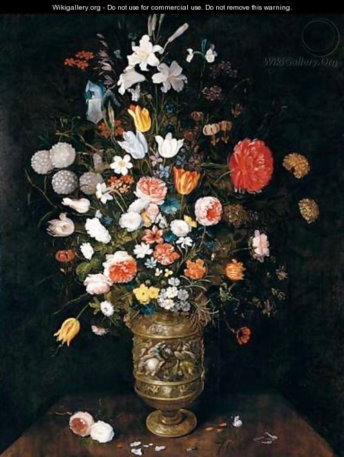 Still Life Of Roses, Daffodils, Carnations, Snake-Head Fritillaries, Irises And Lilies In A Sculpted Parcel-Gilt Vase, Upon A Stone Ledge - Jan, the Younger Brueghel
