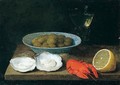 A still life of green olives in a blue and white porcalein bowl - Jacob Foppens Van Es