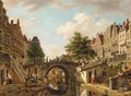 A View Of Utrecht, With A Barge And A Rowing Boat On A Canal Before A Bridge - (after) Jan Hendrik Verheyen