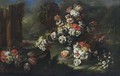 A Still Life With Tulips, Hyacinths, French Marigolds, Daffodils, Poppy Anemones And Other Flowers In A Silver Vase, Together With Tulips, Peonies, Snowballs, French Marigolds, Poppy Anemones And Daffodils Near A Fountain, All In A Garden Setting - Gasparo Lopez