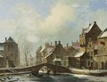 Skaters On A Frozen Canal In A Dutch Town - Cornelis Springer