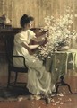 Woman Arranging Flowers - Francis Coates Jones