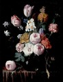 Still Life Of Roses, Tulips, Carnations And Other Flowers In A Glass Vase, Resting On A Table - Nicholaes van Verendael