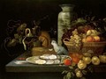 A Banketje Still Life With Fruit, Oysters And A Parrot Arranged Upon A Stone Table Top - (after) Michiel Simons