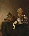 A Still Life Of A Tazza, A Peeled Lemon On A Pewter Plate, A Silver-Gilt Cup With Cover And Grapes - Jan Davidsz. De Heem