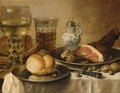 A Still Life Of A Roemer, A Beer Glass, A Ham And A Bread Roll On Pewter Plates - (after) Pieter Claesz