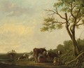 A Shepherdess Milking Cows In A Landscape, Two Travellers Watching On A Bridge Beyond - (after) Jacob Van Strij