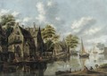 A River Landscape With Figures Outside A Tavern And Yachts Moored Alngside A Houses - Thomas Heeremans
