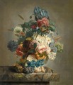 A Still Life Of Roses, Peonies, Irises, Primulae, A Variegated Tulip And Other Flowers, Together With A Birds Nest On A Marble Ledge - M. Van Spaey