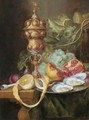 Still Life With A Gilt Pokal, A Bunch Of Grapes, A Plum, A Fig, A Partly Peeled Lemon - (after) Jan Davidsz. De Heem