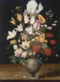 A Still Life With Parrot Tulips, Roses, Irises, And Various Other Flowers In A Vase On A Table Ledge - Antwerp School
