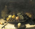 A Still Life With Fruit And Walnuts In A Silver Bowl, A Cask Of Wine, A Knife And Other Objects Laid Out On A Draped Table - (after) Pierre Van BOUCLE (BOECKEL)